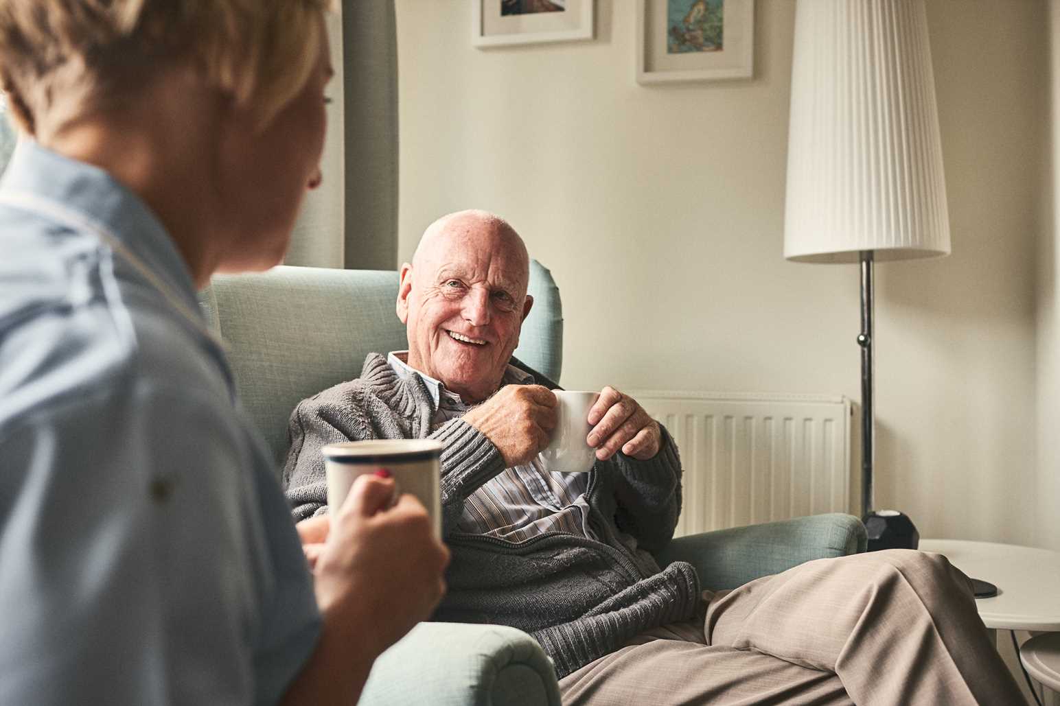 St David's Hospice Care nurse providing Hospice Care at Home to a patient