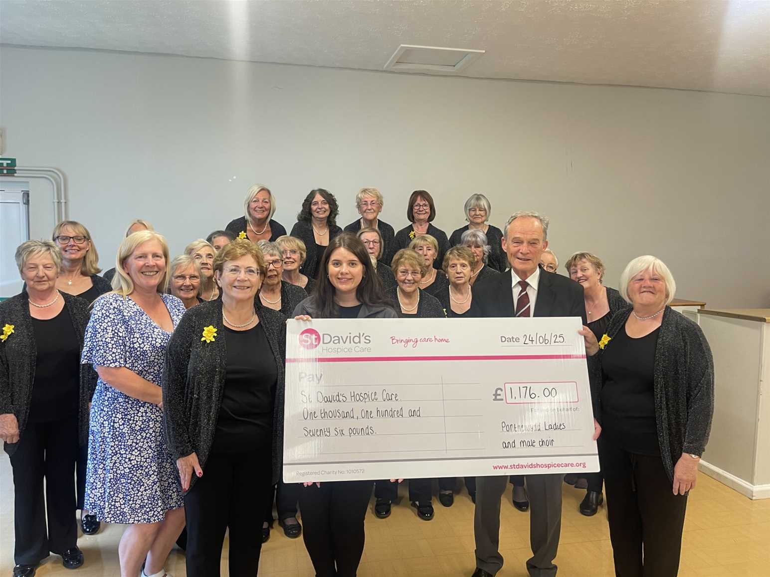 Members of Pontnewydd Ladies and Male Choir, with Community Fundraiser Abi